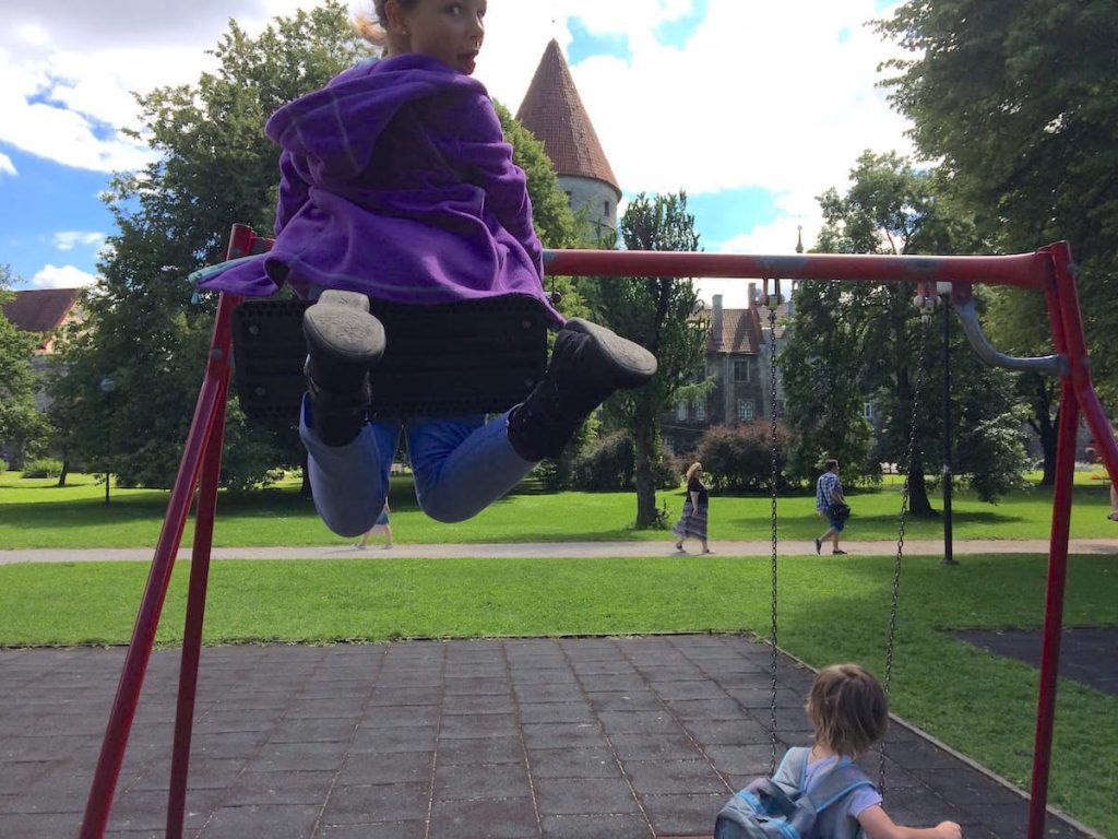 Alpha on the swing doing an epic photobomb of one of the Towers