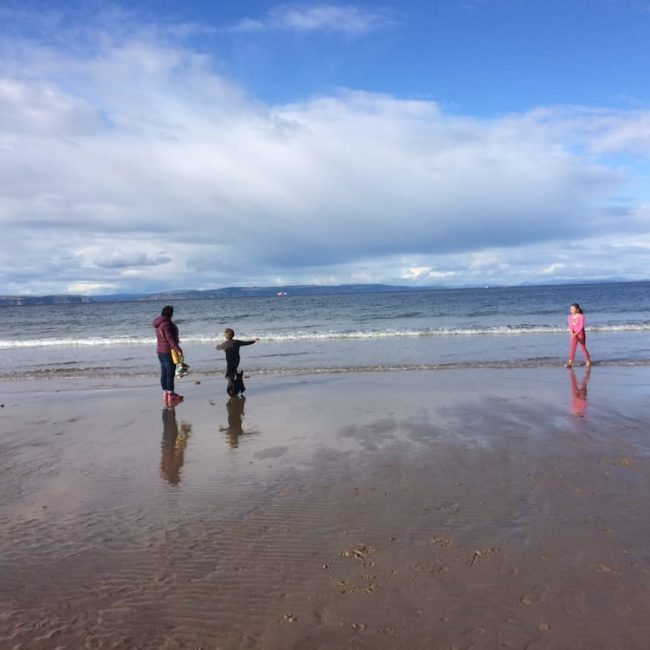 Getting wet and cold at Nairn Beach