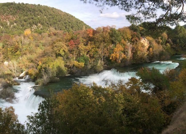 Krka Falls is even more beautiful with its fall colours on, this view from the viewing platform and shops area