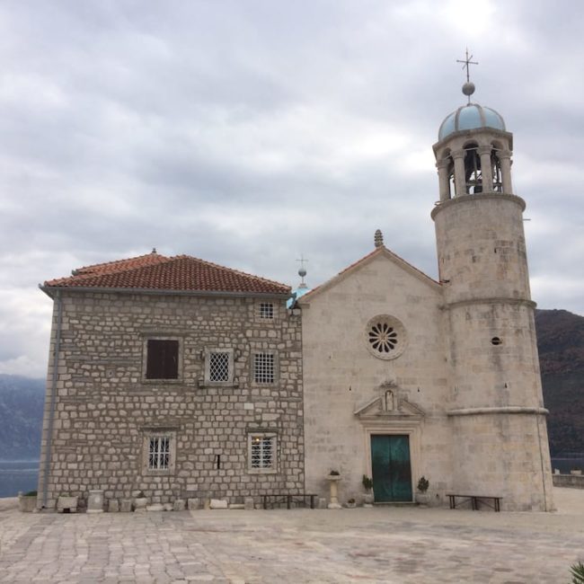 The Church of Our Lady of the Rocks from the boat dock