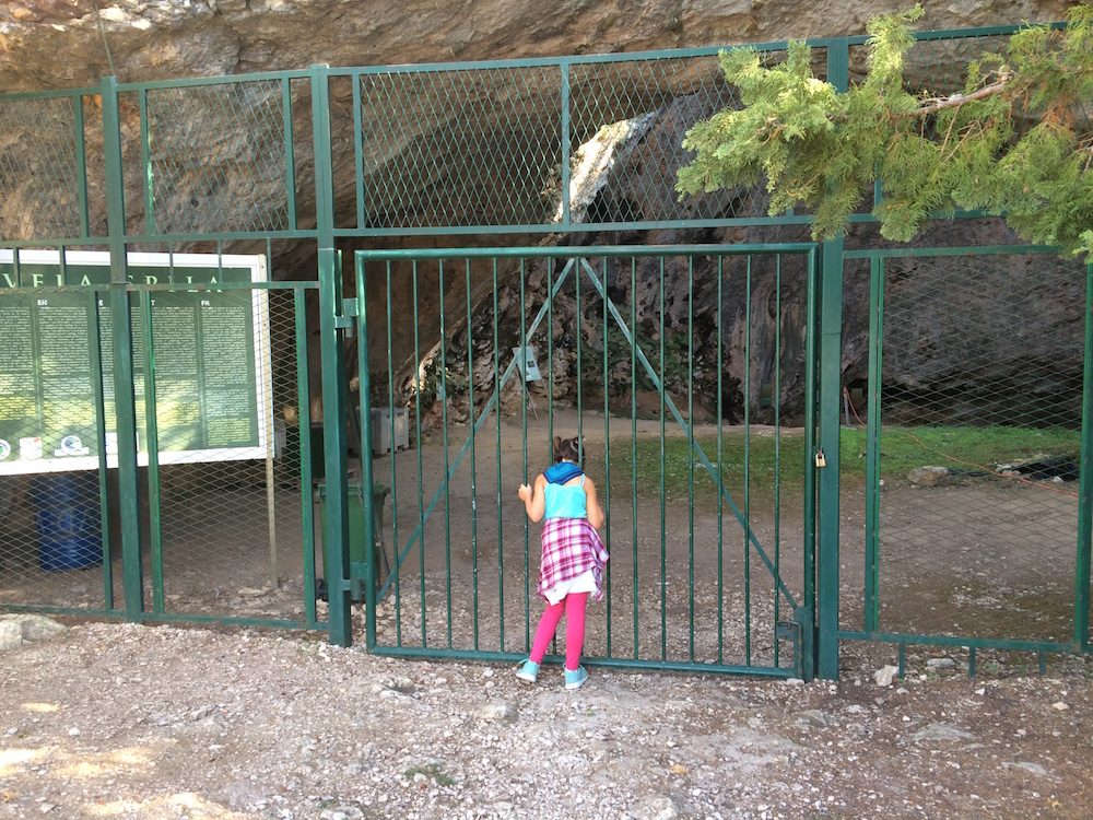 The locked gates at Vela Spila Cave