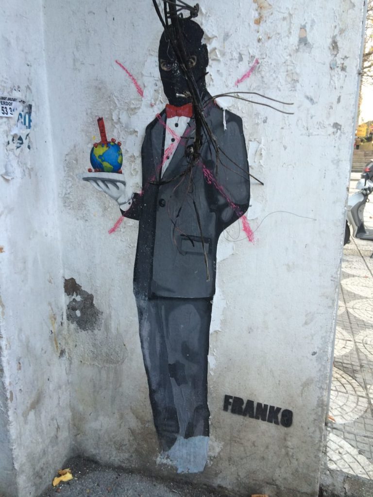Street art, check out the balaklava on this gent
