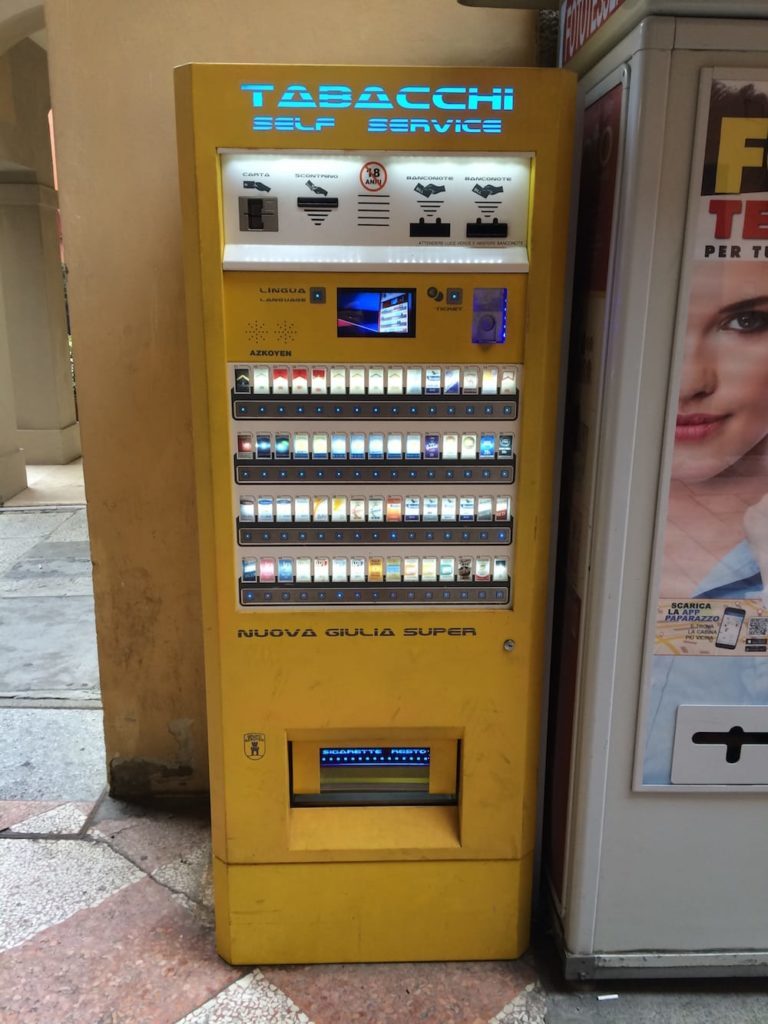 You can get cigarettes from vending machines on the street in Italy, they are pretty cheap too, unfortunately