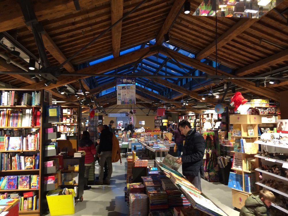 Coop, in Bologna, the most amazing bookstore we've ever seen, we found somewhere to sit