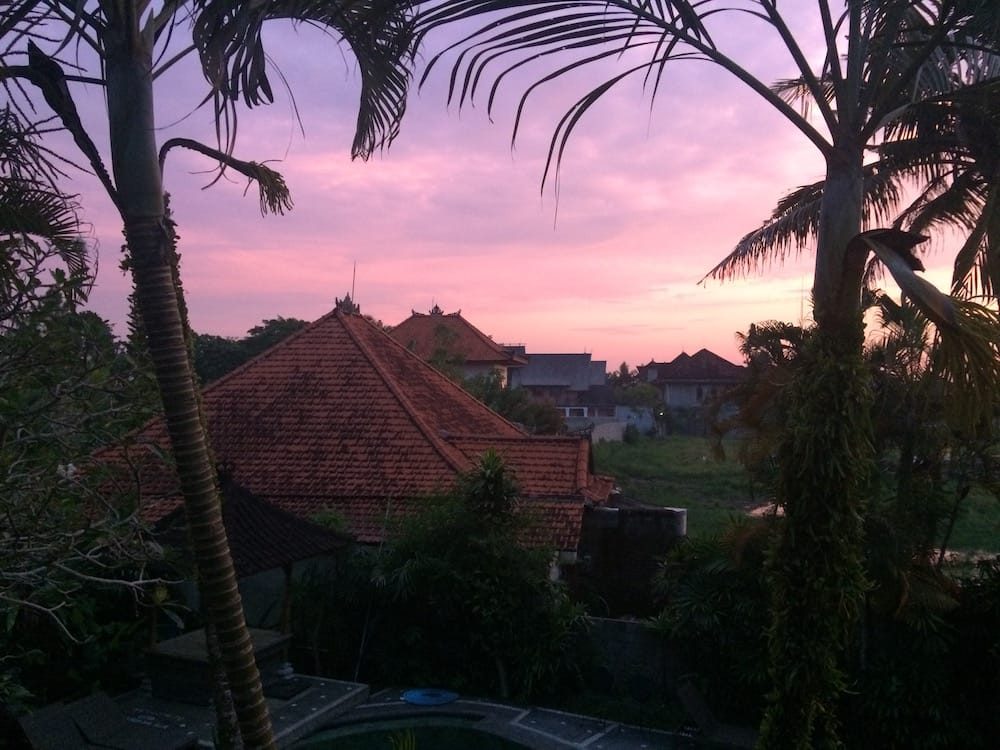 Sunset on Nyepi from the first floor balcony looking at our other neighbor's house