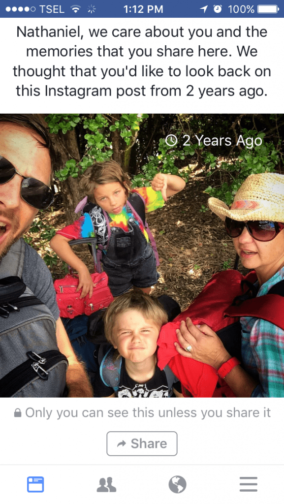 Look at us 2 years ago doing a travel practice run with all our bags on a super hot day in Auckland; so green